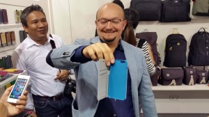 La prochaine sortie de l'iPhone 6 donne le sourire à ce marchand. La prochaine sortie de l'iPhone 6 donne le sourire à ce marchand.