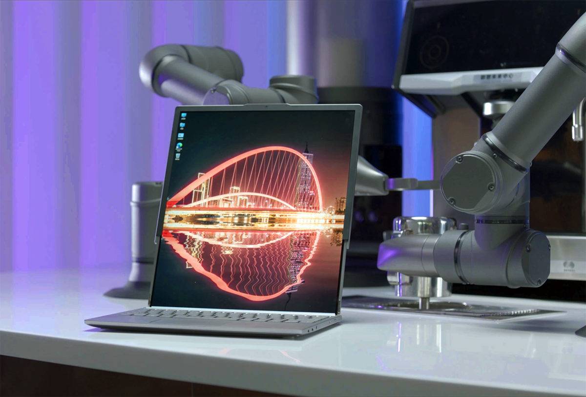 Un prototype de PC Lenovo à écran enroulable. Un prototype de PC Lenovo à écran enroulable.